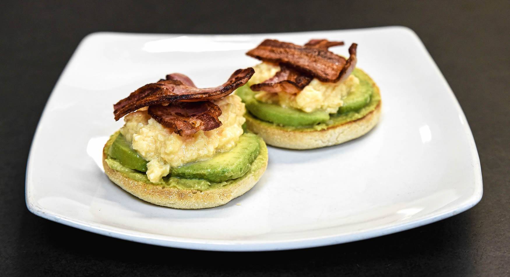Scrambled Eggs and Avocado on an English Muffin.